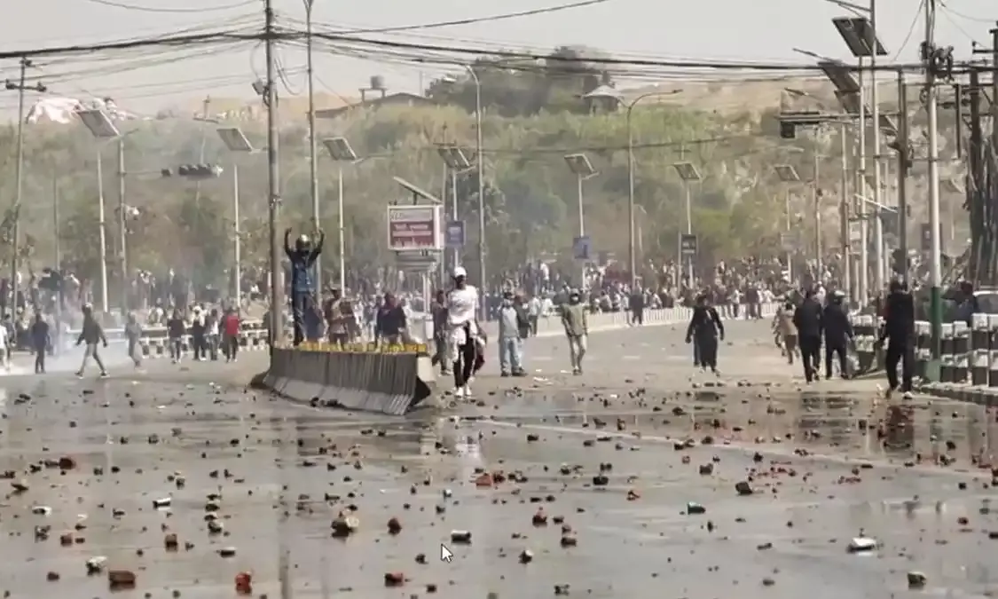 At least two people are killed in Nepal when pro-monarchy demonstrators and police skirmish during a demonstration.