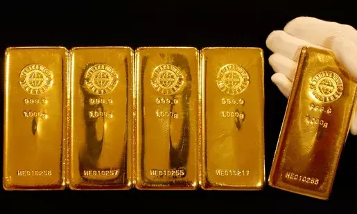 Gold prices surge to new record high amid worries about impact of Trump tariffs on global economy