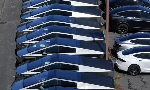 Elon Musks Tesla cuts Cybertruck production targets, shifts workers due to falling sales: Report